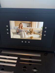 Scherm in het DUETTE® Collectieboek met de knoppen 1 tot en met 6 om een video te kiezen